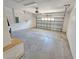 Spacious garage with an automatic door and ample space for parking and storage at 10238 Perthshire Cir, Land O Lakes, FL 34638