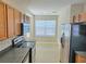 Well-equipped kitchen featuring stainless steel appliances and ample counter space at 10238 Perthshire Cir, Land O Lakes, FL 34638