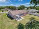 Aerial view of home with a backyard, patio, and fire pit at 10478 Laval St, Spring Hill, FL 34608