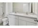 Bright bathroom with a double sink vanity and a shower-tub combination at 10823 Penny Gale Loop, San Antonio, FL 33576