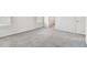 Cozy bedroom featuring soft carpet, neutral walls, and a window providing natural light at 10823 Penny Gale Loop, San Antonio, FL 33576