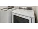 Modern white Samsung washing machine and dryer appliances at 10823 Penny Gale Loop, San Antonio, FL 33576