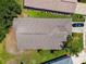 Aerial view showcases the home's roof and surrounding lush green landscape, highlighting neighborhood streetscape at 1119 Dustan Pl, Trinity, FL 34655