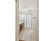 Ensuite bathroom featuring a glass enclosed shower and vanity with a sink at 1119 Dustan Pl, Trinity, FL 34655
