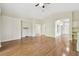 A spacious living room featuring wood floors, neutral paint colors, and an open-concept design at 1119 Dustan Pl, Trinity, FL 34655
