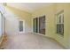 Covered patio with tile flooring, offering a relaxing outdoor space at 1119 Dustan Pl, Trinity, FL 34655