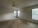 Bedroom featuring natural light from multiple windows, offering a bright and airy feel at 11213 Brooklawn Dr, Hudson, FL 34667