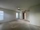 Bedroom with neutral walls, a ceiling fan and an ensuite bathroom at 11213 Brooklawn Dr, Hudson, FL 34667