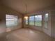 Cozy dining area with natural light shining through big windows at 11213 Brooklawn Dr, Hudson, FL 34667