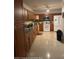 A spacious kitchen featuring wood cabinets, granite countertops, and stainless steel appliances at 1127 Lodge Cir, Spring Hill, FL 34606