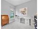 Office with light gray walls and white desks at 11325 Juglans Dr, Odessa, FL 33556