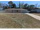 Charming single-story home with an attached garage and a well-manicured front yard at 12116 Lamont Dr, Spring Hill, FL 34608