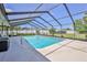 Relaxing pool and patio area are perfect for outdoor gatherings at 12191 Monarco Ln, Spring Hill, FL 34609