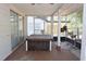 Covered back porch with a hot tub and a view of the backyard at 12210 Quail Run Row, Hudson, FL 34667