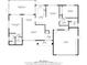 First floor plan featuring two bedrooms, two baths, living room, dining room, kitchen, laundry, and a garage at 12210 Quail Run Row, Hudson, FL 34667