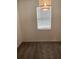 This bedroom features neutral carpeting, natural light, and minimal decor at 12630 Aston Dr, Hudson, FL 34669