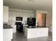 Bright and spacious kitchen with an island, modern appliances, and ample cabinet space at 12630 Aston Dr, Hudson, FL 34669