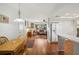 View of the dining area with a table, chairs, and easy access to the kitchen and living room at 12906 Sandburst Ln, Hudson, FL 34667