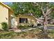 Well-maintained home with a brick walkway and attached garage entrance at 12906 Sandburst Ln, Hudson, FL 34667
