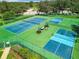 Community tennis and pickleball courts with picnic area at 13111 Precept Way, Hudson, FL 34669