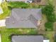 Overhead aerial view of the home showing the roof, fenced in backyard and outdoor seating area at 13111 Precept Way, Hudson, FL 34669