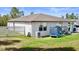 Well-maintained backyard with a trampoline and playground, perfect for outdoor fun at 13205 Arkendale St, Spring Hill, FL 34609