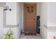 Inviting front entry featuring a decorative wreath, welcome mat, and a 'HOME' sign at 13205 Arkendale St, Spring Hill, FL 34609