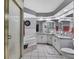 Bathroom with stand alone tub, shower, and double sink vanity at 13373 Lawrence St, Spring Hill, FL 34609
