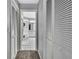 Hallway view into the primary bathroom at 13373 Lawrence St, Spring Hill, FL 34609