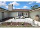 Charming front yard with lovely stone landscaping and a cozy seating area at 13373 Lawrence St, Spring Hill, FL 34609