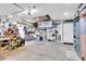 Well-organized garage featuring ample storage and various tools and equipment at 13524 Knotty Ln, Hudson, FL 34669