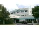 Regional Medical Center at Bayonet Point featuring a clean, modern facade and ample parking at 13524 Knotty Ln, Hudson, FL 34669