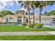 Charming single-story home with mature landscaping and inviting curb appeal at 1496 Overland Dr, Spring Hill, FL 34608