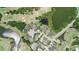 Overhead view of elegant homes with private pools, nestled within a golf course and pond community at 15906 Prince William Pl, Odessa, FL 33556