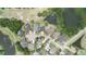 Residential community features beautiful homes with manicured lawns and a tranquil water view at 15906 Prince William Pl, Odessa, FL 33556