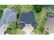 Beautiful home is surrounded by lush landscaping, creating a private oasis, and serene water views at 15906 Prince William Pl, Odessa, FL 33556