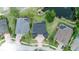 Beautiful home is surrounded by lush landscaping and a tranquil pond, creating a private oasis at 15906 Prince William Pl, Odessa, FL 33556