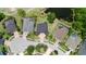 Suburban homes are situated in a well-planned neighborhood near a picturesque pond and mature trees at 15906 Prince William Pl, Odessa, FL 33556