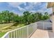 Balcony with a view of the lake and trees at 15906 Prince William Pl, Odessa, FL 33556