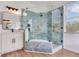Bathroom with a glass shower and a window at 15906 Prince William Pl, Odessa, FL 33556