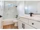 Bathroom featuring a tub/shower combo and updated vanity at 15906 Prince William Pl, Odessa, FL 33556