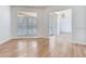 Bright living room with light wood flooring and large window at 15906 Prince William Pl, Odessa, FL 33556
