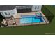 Aerial view of a backyard with a stunning pool, spa, and patio area, surrounded by a sleek black fence at 15906 Prince William Pl, Odessa, FL 33556