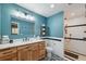 Beautiful bathroom featuring a modern vanity, updated fixtures, and a walk-in shower with decorative tile at 1700 Beachway Ln, Odessa, FL 33556