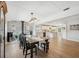 Dining room leading into a kitchen at 1700 Beachway Ln, Odessa, FL 33556