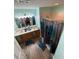 Bathroom featuring a double sink vanity, shower, and updated finishes at 18027 Baywood Forest Dr, Hudson, FL 34667