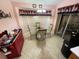 Breakfast nook with bay window and view to backyard at 18027 Baywood Forest Dr, Hudson, FL 34667