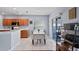 Eat-in kitchen featuring a dining area with a view of the backyard, complemented by stainless steel appliances at 18061 Glastonbury Ln, Land O Lakes, FL 34638