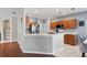 Spacious kitchen with white marble countertops, stainless steel appliances, and an open design at 18061 Glastonbury Ln, Land O Lakes, FL 34638