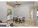 Bright dining room with a neutral color scheme and tile flooring at 1810 Winsloe Dr, Trinity, FL 34655